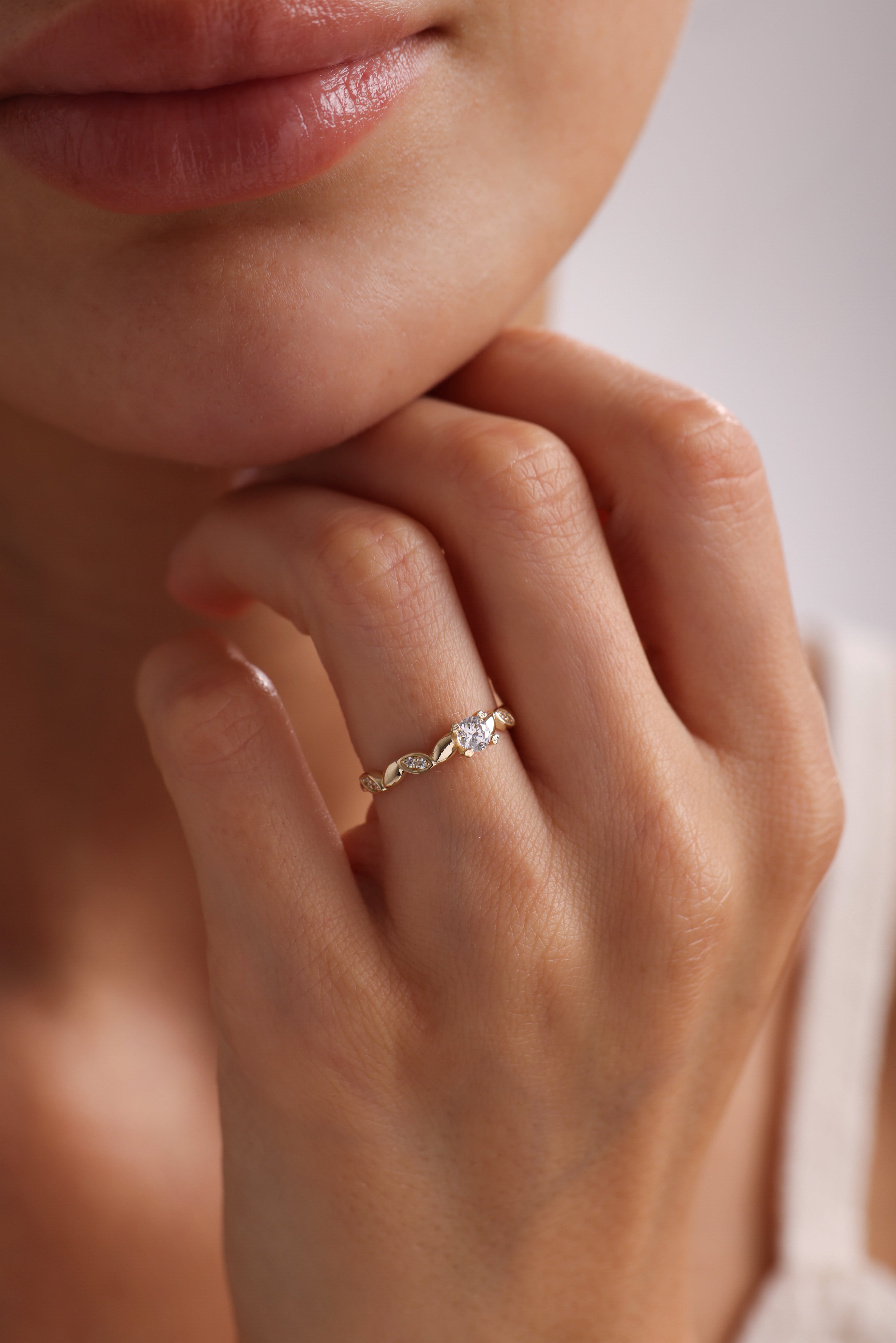 14k Gold Round Diamond Solitaire Ring with Marquise Accents